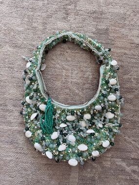 Handcrafted Green Beaded Shoulder Bag with Shell Accents
